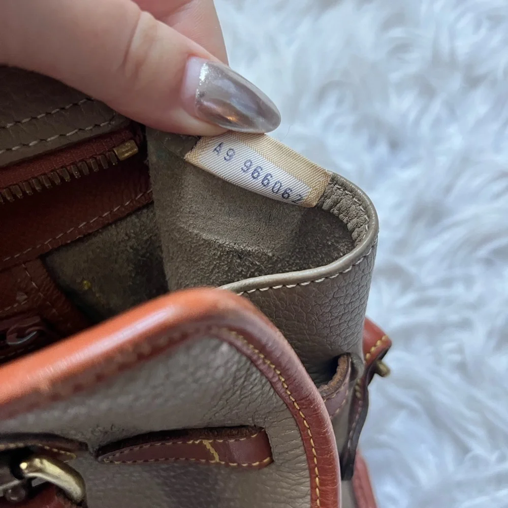 Dooney and Bourke All Weather Leather Buckle Purse